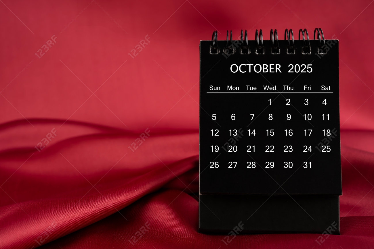 Black Desk Calendar For October 2025 On A Red Color Satin Or Silk Textile Background Stock Photo Picture And Royalty Free Image Image 237807634 